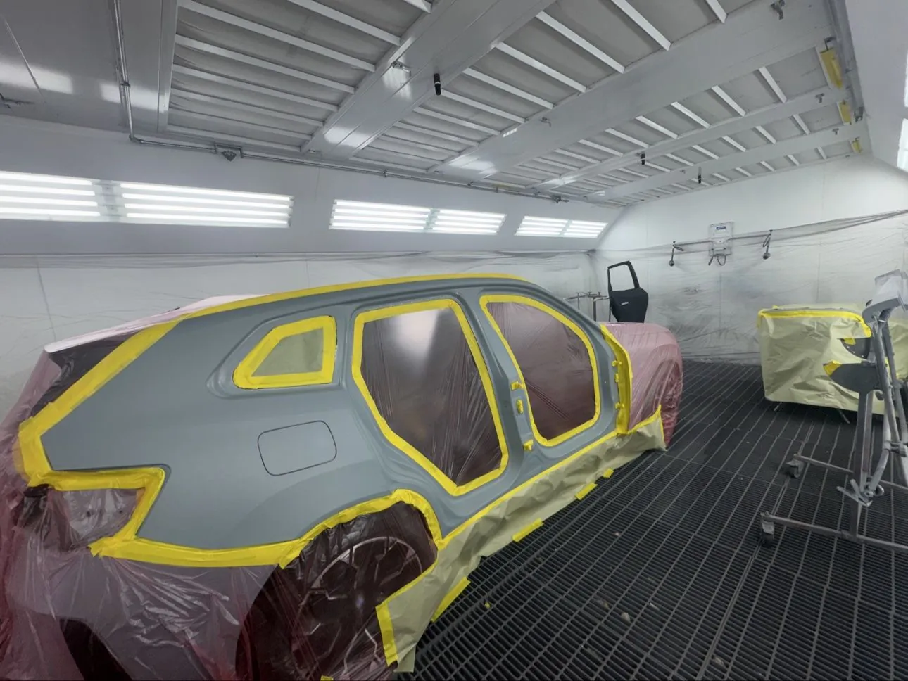 2026 BMW X3 masked and prepped for paint at Crown Auto Body
