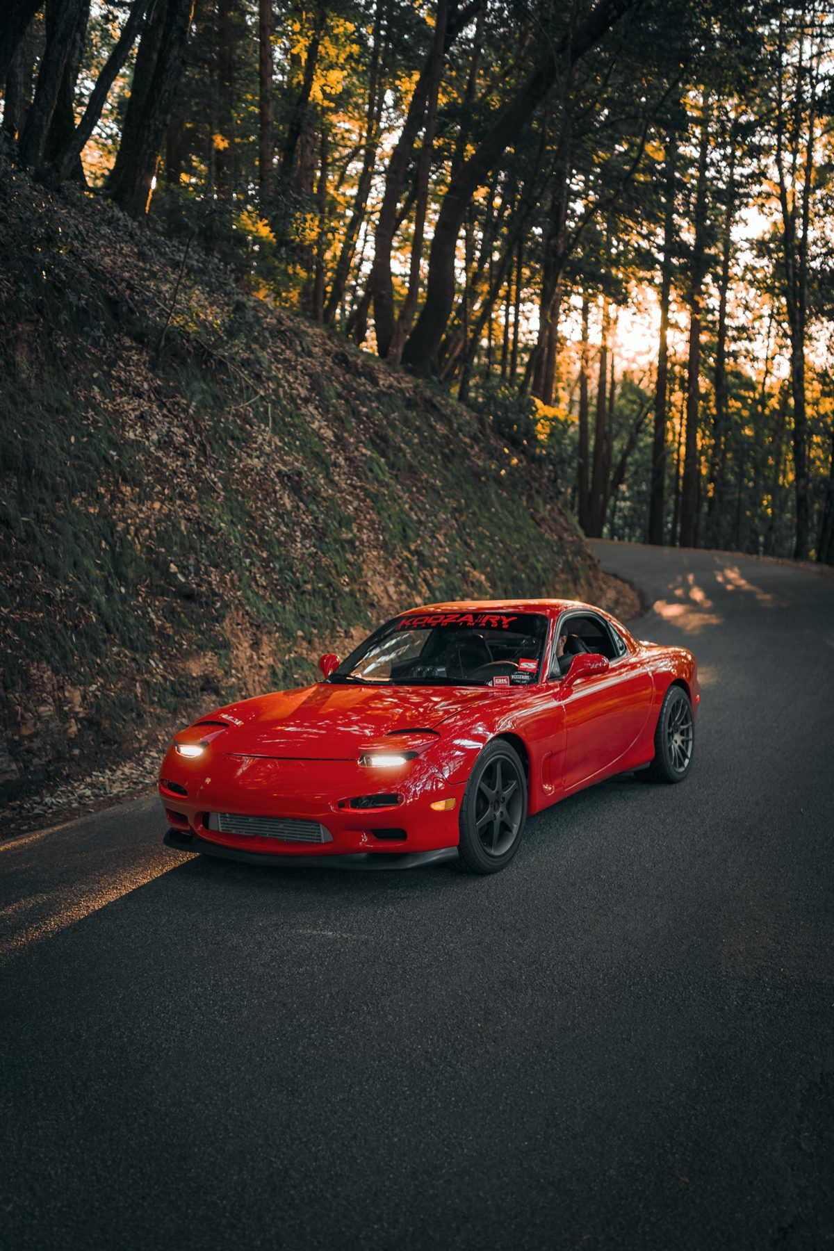 Mazda RX-7 stock body front view before widebody transformation at Crown Auto Body